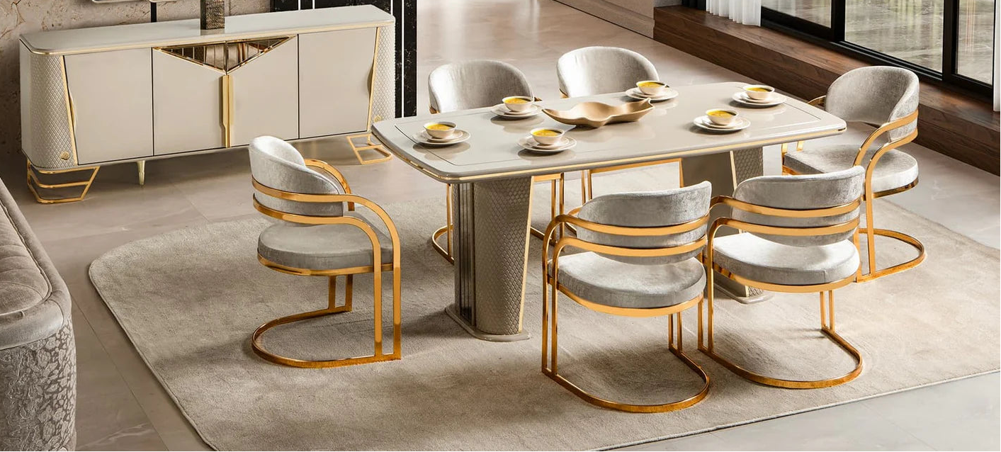 Modern dining room with a table, chairs, and decorative elements.